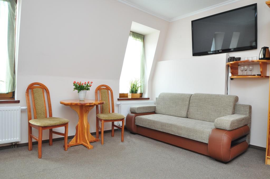 Aparthotel Mikolajki Pokoj fotografie